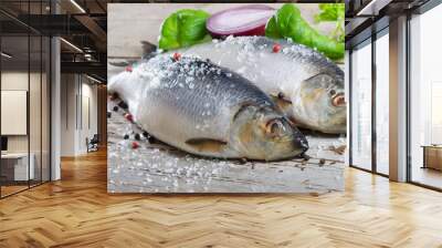 Two herrings on a wooden table Wall mural