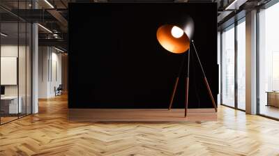 Desk lamp on empty wooden office table Wall mural