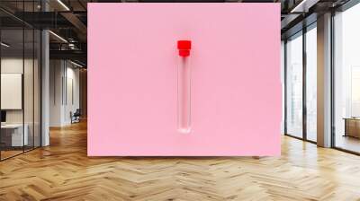 Empty specimen tube on pink background Wall mural