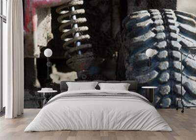 Shock absorber of an off road car Wall mural