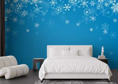 Falling snowflakes on blue background Wall mural