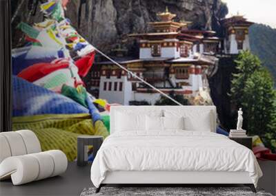 Bhutan Taktshang monastery Tigers Nest temple sight on a mountain with prayer flags Wall mural