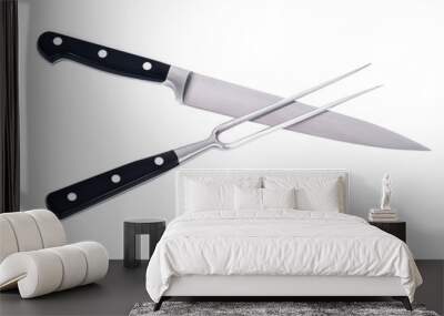 Carving knife and fork separated on white background Wall mural