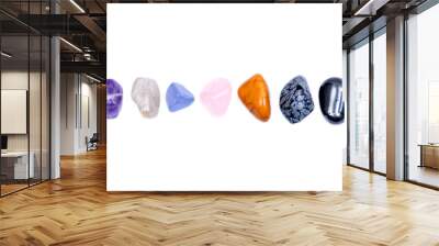 Set of seven healing chakra stones for crystal healing, isolated on white background  Wall mural