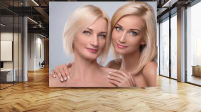 beautiful middle aged mother and her adult daughter Wall mural