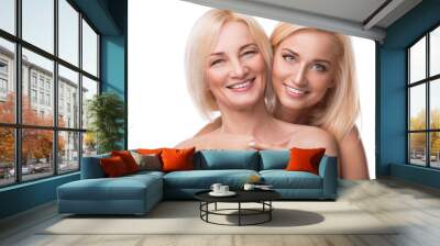 Beautiful middle aged mother and her adult daughter Wall mural