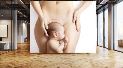 Newborn baby and his mother with a scar after C-Section on her belly Wall mural