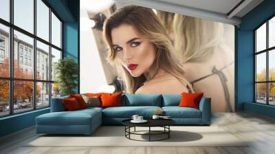 Portrait of stunning woman with a beautiful makeup and hairstyle Wall mural