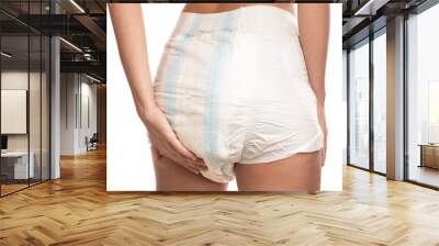 Woman wearing adult diaper against white background. Wall mural