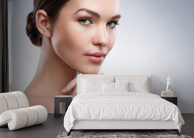 Young woman with beautiful face Wall mural