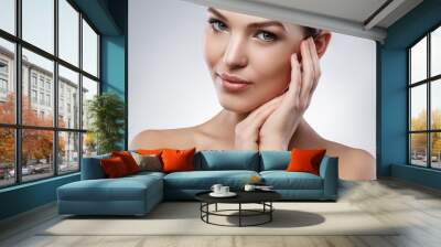 Young woman with beautiful face Wall mural