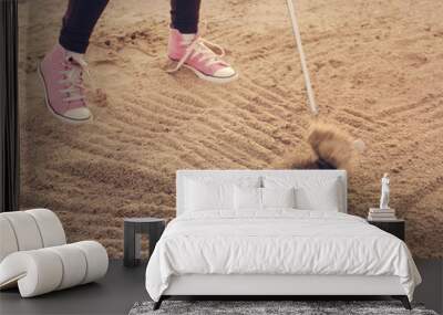 Golf swing, teenager out of sandtrap Wall mural