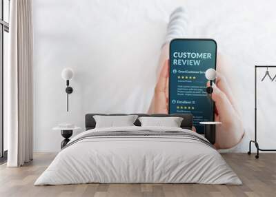 Customer Experience Concept. Woman lying on Bed to Reading Online Review via Smartphone before Buying Products and Services, More Positive Feedback on Mobile Screen Wall mural