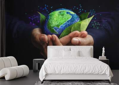 ESG Concept. Nature Meet Technology. Green Energy, Renewable and Sustainable Resources. Environmental and Ecology Care. Hand Embracing Green Leaf and Globe Wall mural