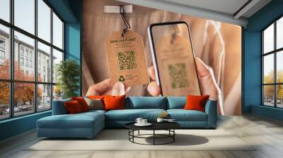 Recycling Products Concept. Organic Cotton Recycled Cloth. Zero Waste Materials. Environment Care, Reuse, Renewable for Sustainable Lifestyle. Using Mobile Phone to Scan on Tag for more Information Wall mural