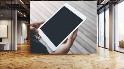 close-up hand hold digital tablet blank screen Wall mural