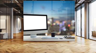 desktop computer on work table and city night background Wall mural