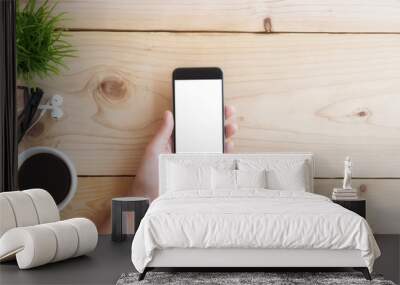 hand use phone white screen on wood table Wall mural