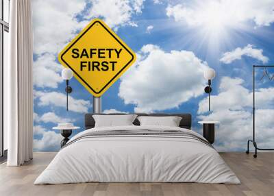 safety first sign on blue sky Wall mural