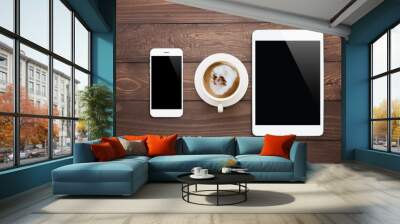 white phone tablet and coffee cup on wood table top view Wall mural