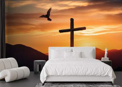 Holy cross symbolizing the death and resurrection of Jesus Christ shrouded in light and clouds at sunset Wall mural