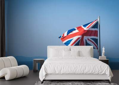 National flag of Great Britain at sea Wall mural