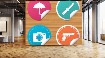 Round stickers or website banners. Gun weapon icon.Knife, umbrella and photo camera signs. Edged hunting equipment. Prohibition objects. Circle badges with bended corner. Vector Wall mural