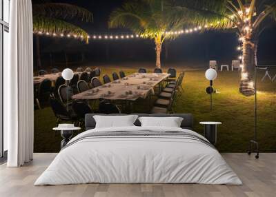 group dinner by beach with light decoration Wall mural