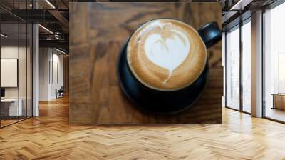 Hot cappuccino coffee with milk latte art of heart shape on wood Wall mural