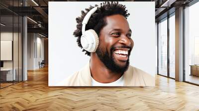 Handsome bearded black man wearing headphones, listening to music isolated on white background. Banner design. Listening to music.
 Wall mural