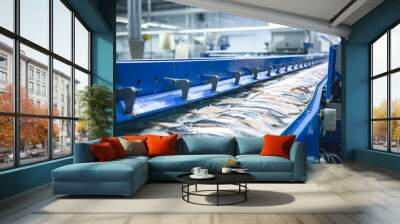 Raw sea fish on a factory conveyor. Production of canned fish. Modern food industry. Fish processing plant.
 Wall mural