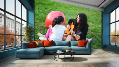 happy young woman mother play and outdoor with beautiful child Wall mural