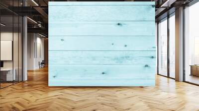 Light blue neon wooden background made of natural wood. The view from the top. Natural untreated planed texture of the rocks of the pine. The surface of the table to shoot flat lay. Copy paste Wall mural