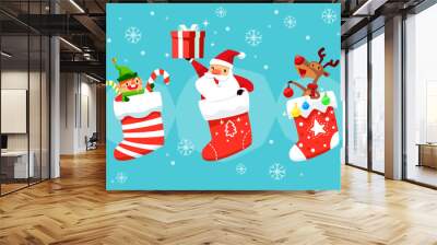 Santa claus elf and reindeer in christmas socks Wall mural