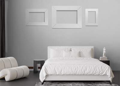 White pictures frame, Vertical and horizontal hanging on a gray wall. Wall mural