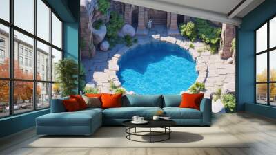 A serene stone pool surrounded by lush greenery and ancient ruins, perfect for relaxation and nature appreciation. Wall mural