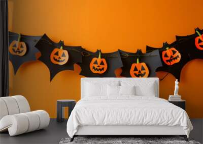 Spooky Halloween garland with black bats and orange pumpkins Wall mural