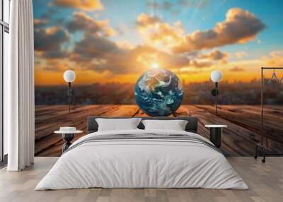 Earth Globe on Wooden Platform at Sunset Wall mural