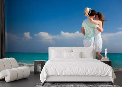 Couple at tropical beach Wall mural