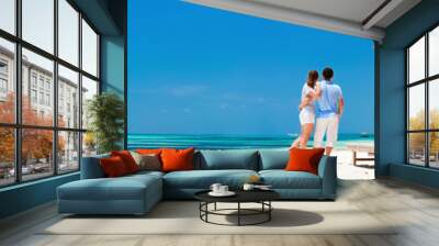 Couple at tropical beach Wall mural