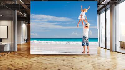 father and daughter at beach Wall mural