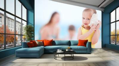 Little girl with a seashell Wall mural