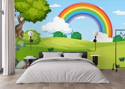 Nature scene background with rainbow in the sky Wall mural