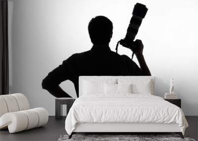 Man with camera. Silhouette of man holding camera and holding ha Wall mural