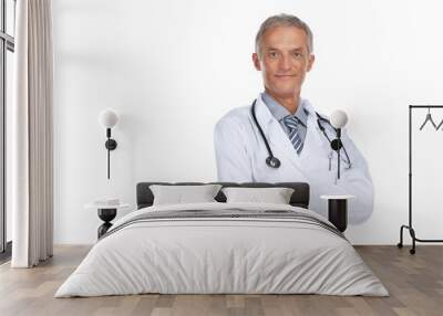 Smiling adult doctor looking at camera. Wall mural