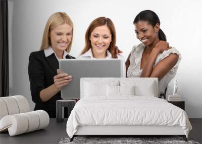 Three businesswoman with laptop Wall mural