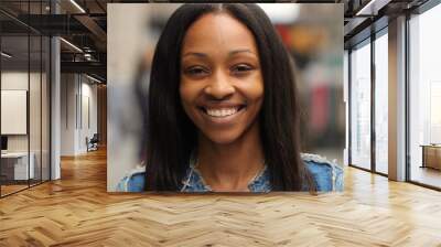 Young black woman in city face portrait Wall mural