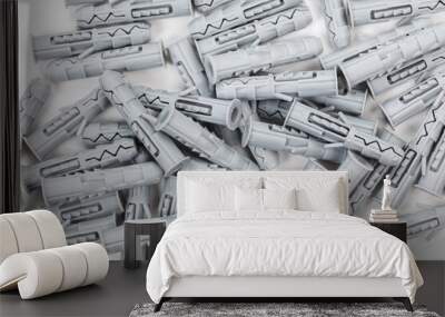 Plastic wall dowel plugs on white background. Close-up Wall mural