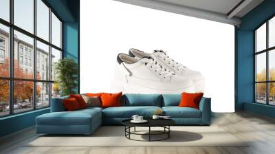 White women's sports shoes made of leather isolated on a white background. Minimal concept of beauty and sports. Wall mural