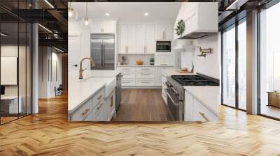 Beautiful kitchen detail in new luxury home. Features island, pendant lights, hardwood floors, and stainless steel appliances Wall mural